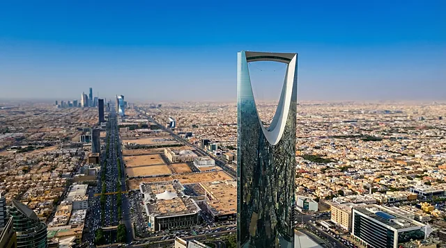 Aerial view over Riyadh with the Kingdom Centre tower in the foreground